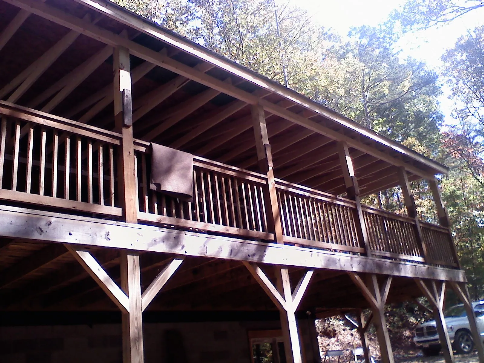 Timber framing under a new elevated porch and deck — Roof Leak Repair in Green Mountain by Roofing Brothers